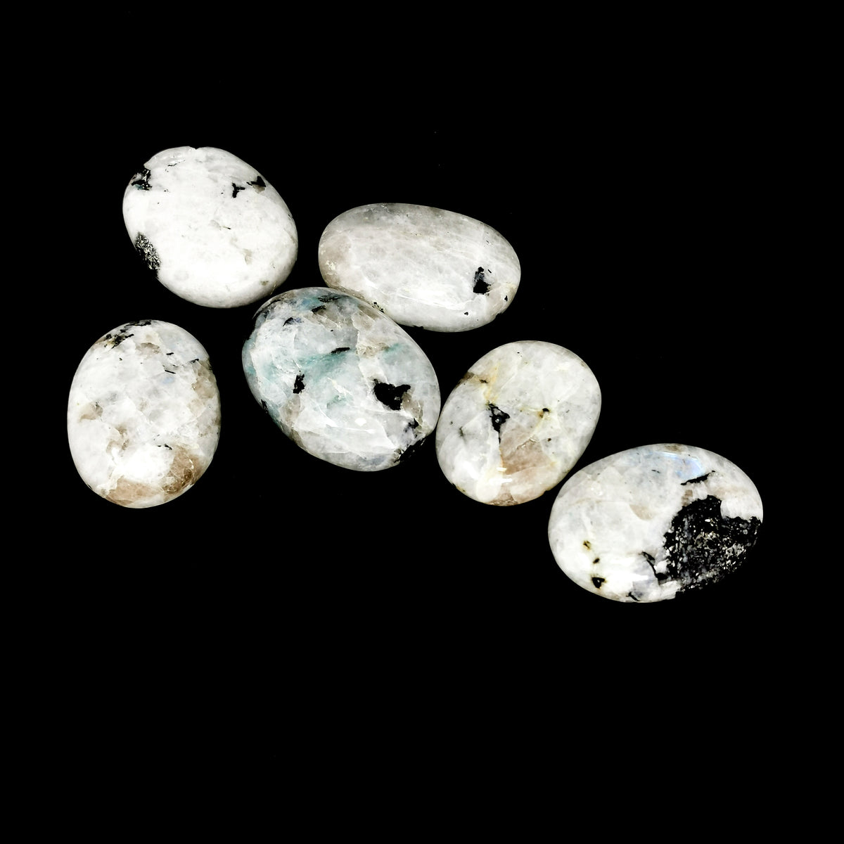 Rainbow Moonstone palm stone, a feldspar.