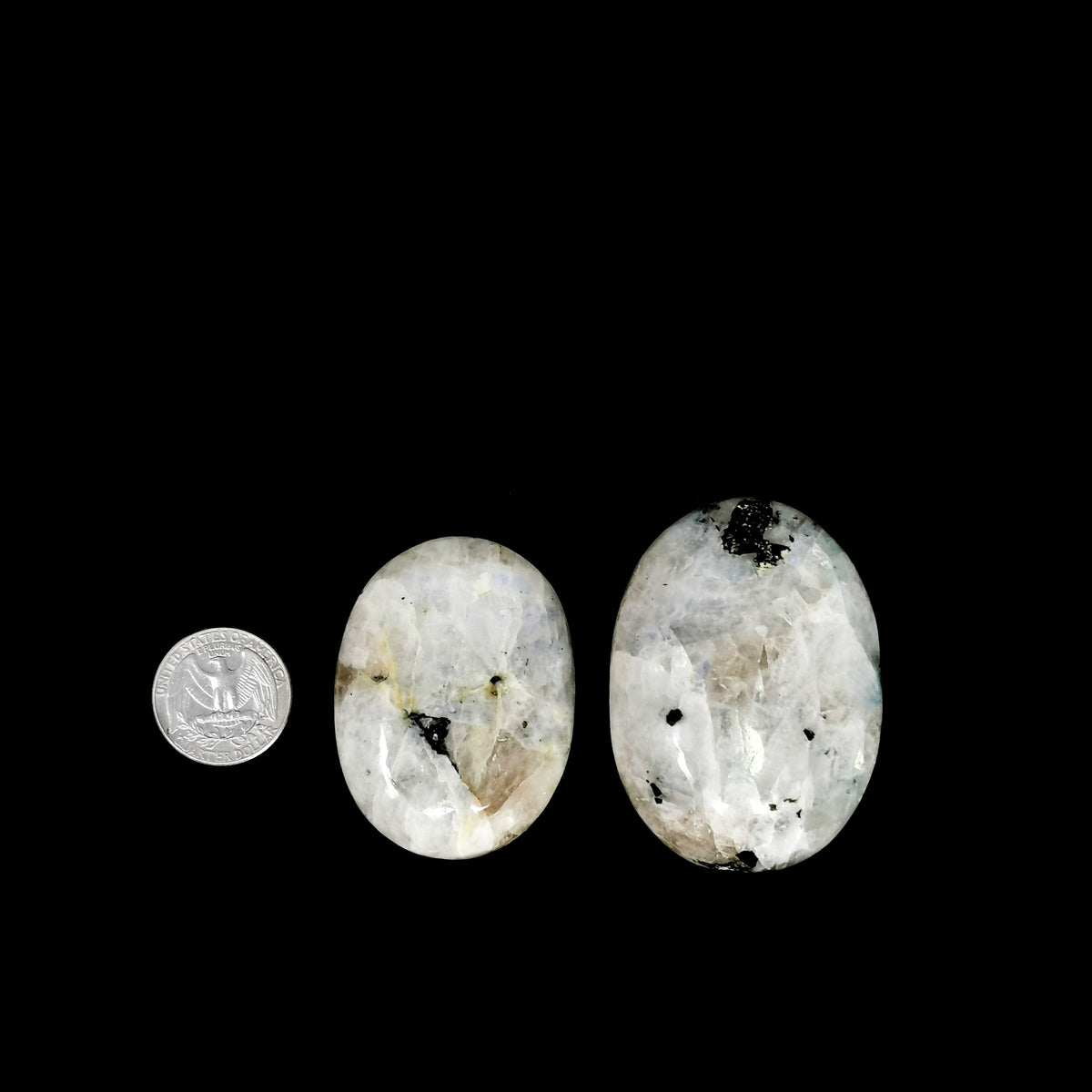 Rainbow Moonstone palm stone, a feldspar.