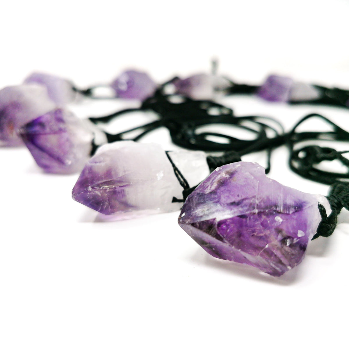 Raw Amethyst Crystal on String pendant.