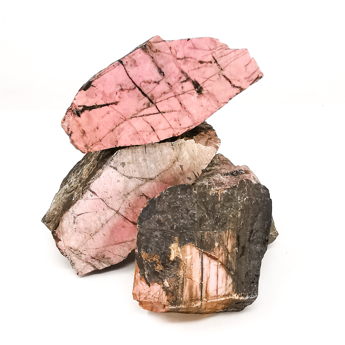 Rhodonite Pink rough, a manganese silicate.