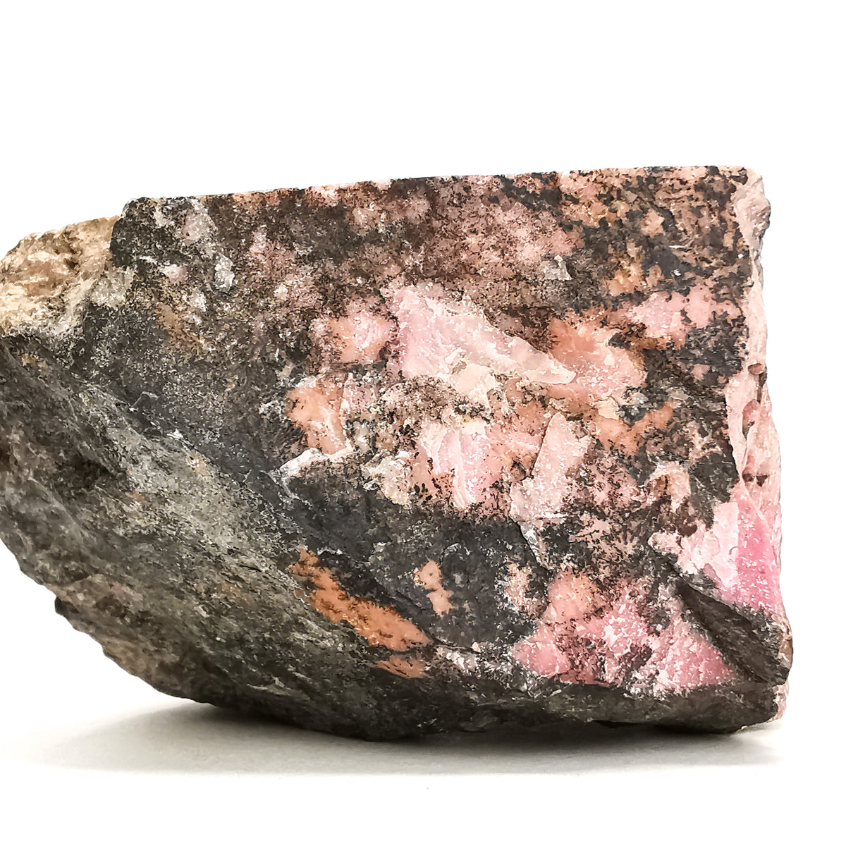 Rhodonite Pink rough, a manganese silicate.
