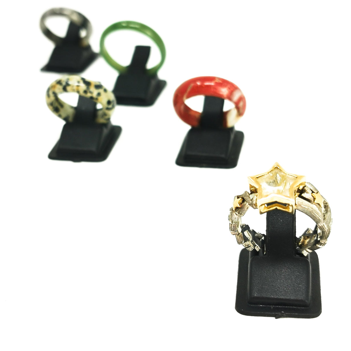 Black Ring Holder display, made of plastic.