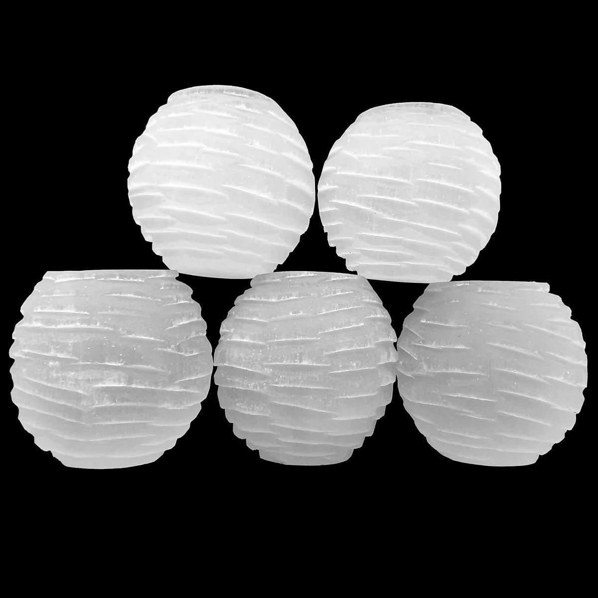 Selenite ridged circle candle holder, a variety of gypsum, from Morocco.