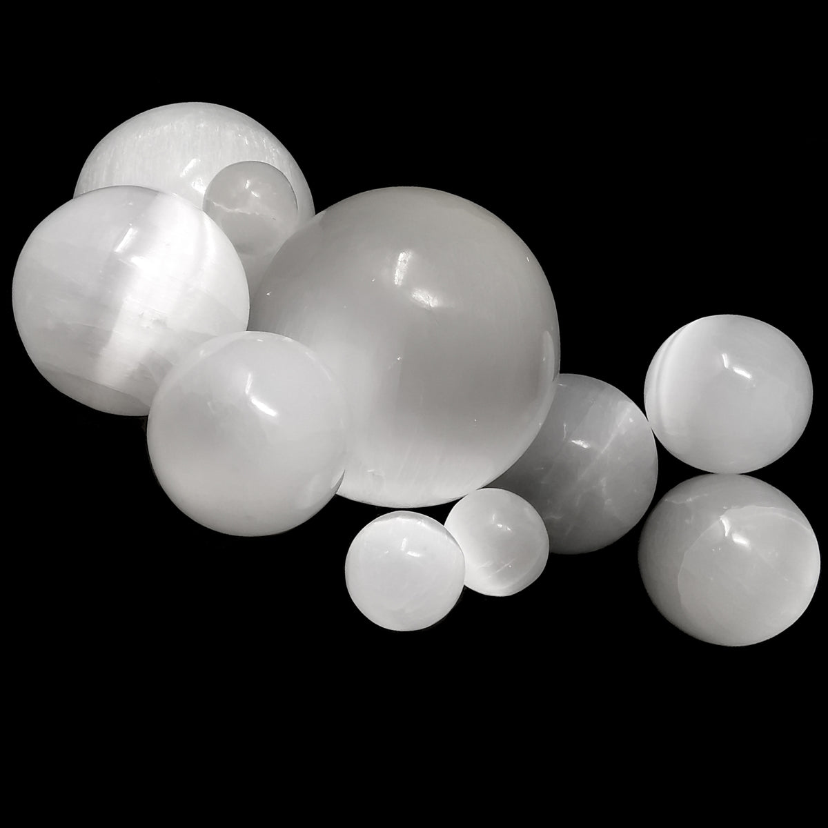 Selenite (satin spar) sphere from Morocco – group of spheres