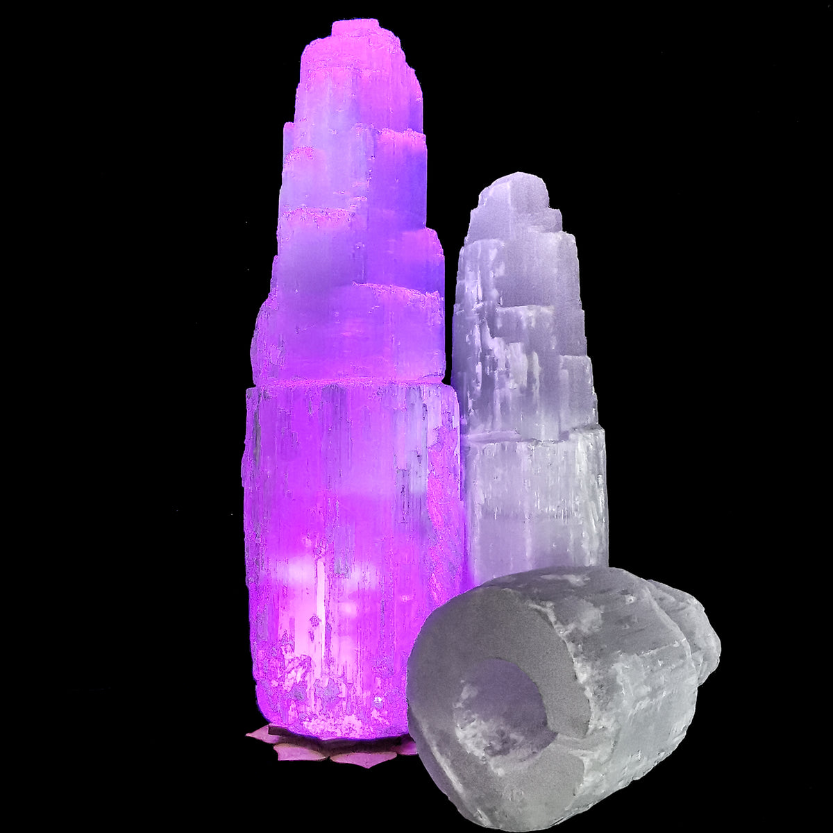 Drilled selenite tower lamp from Morocco – tower lit with a light