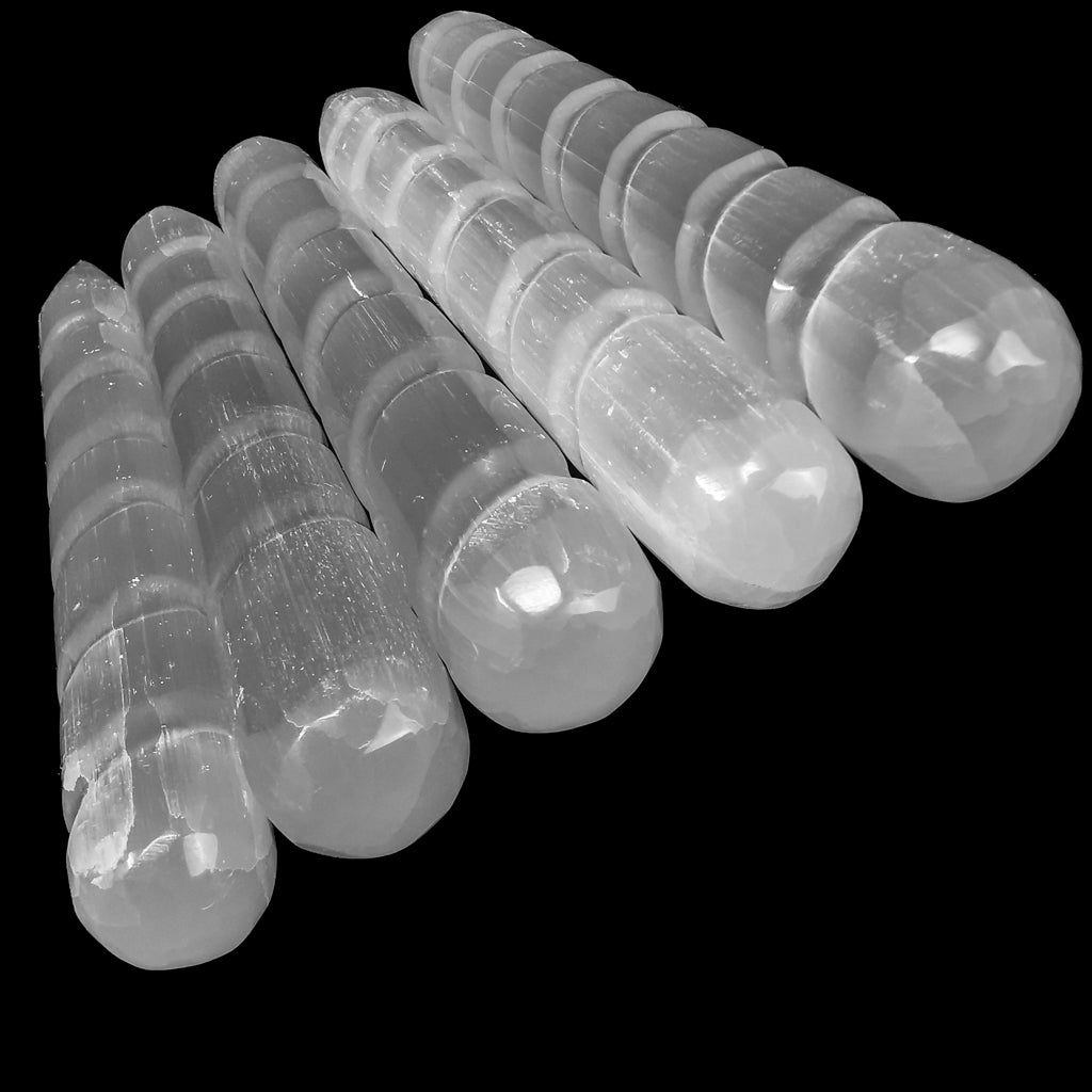 Selenite twist wand from Morocco – row of wands, angled