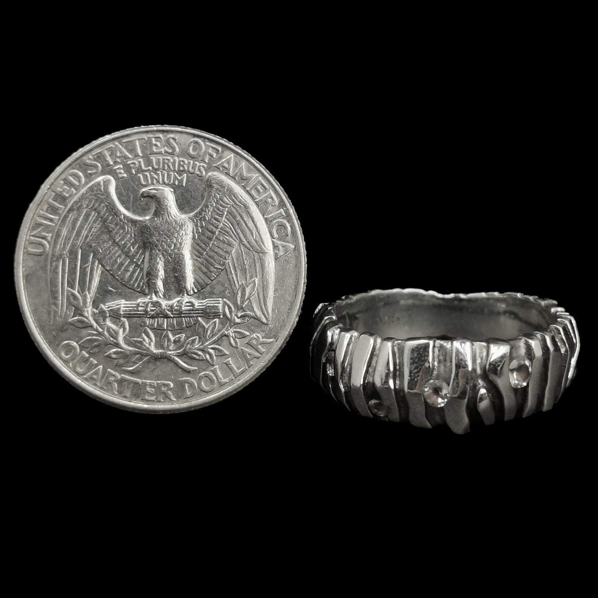 Zebra ring in sterling silver with 5 diamonds.