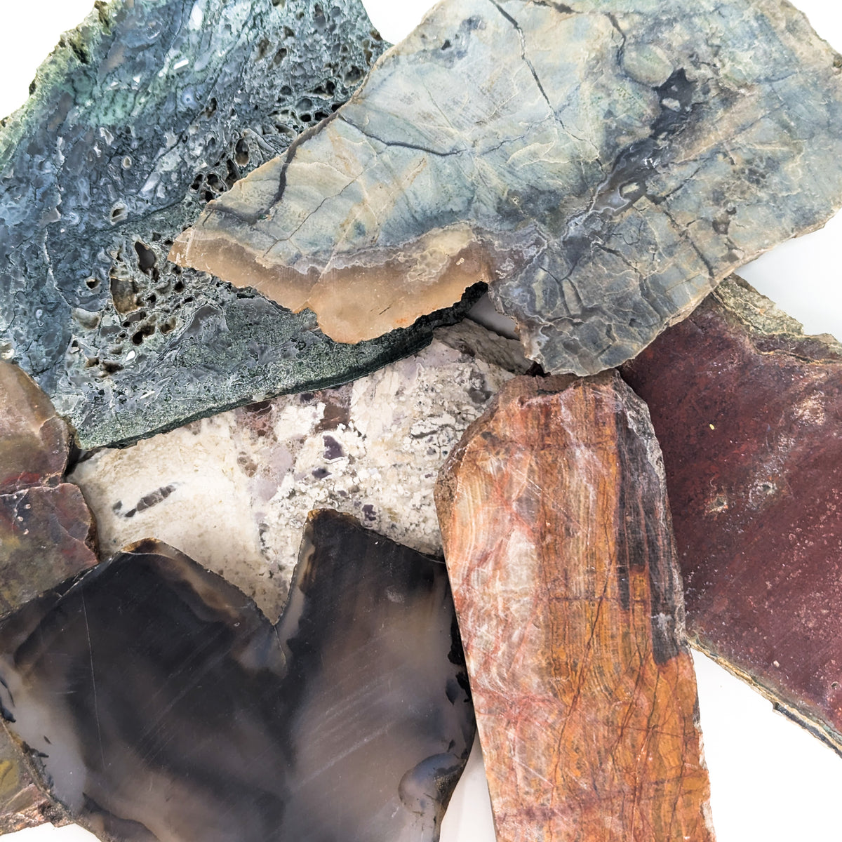 Assorted lapidary slab – close-up of stacked slabs