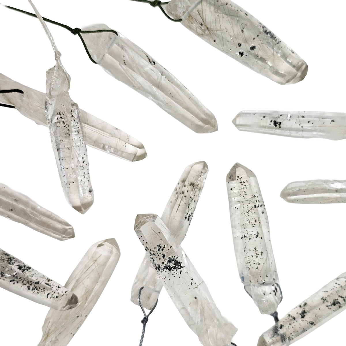 Actinolite quartz drilled pendant, BC: scatter of points with inclusions