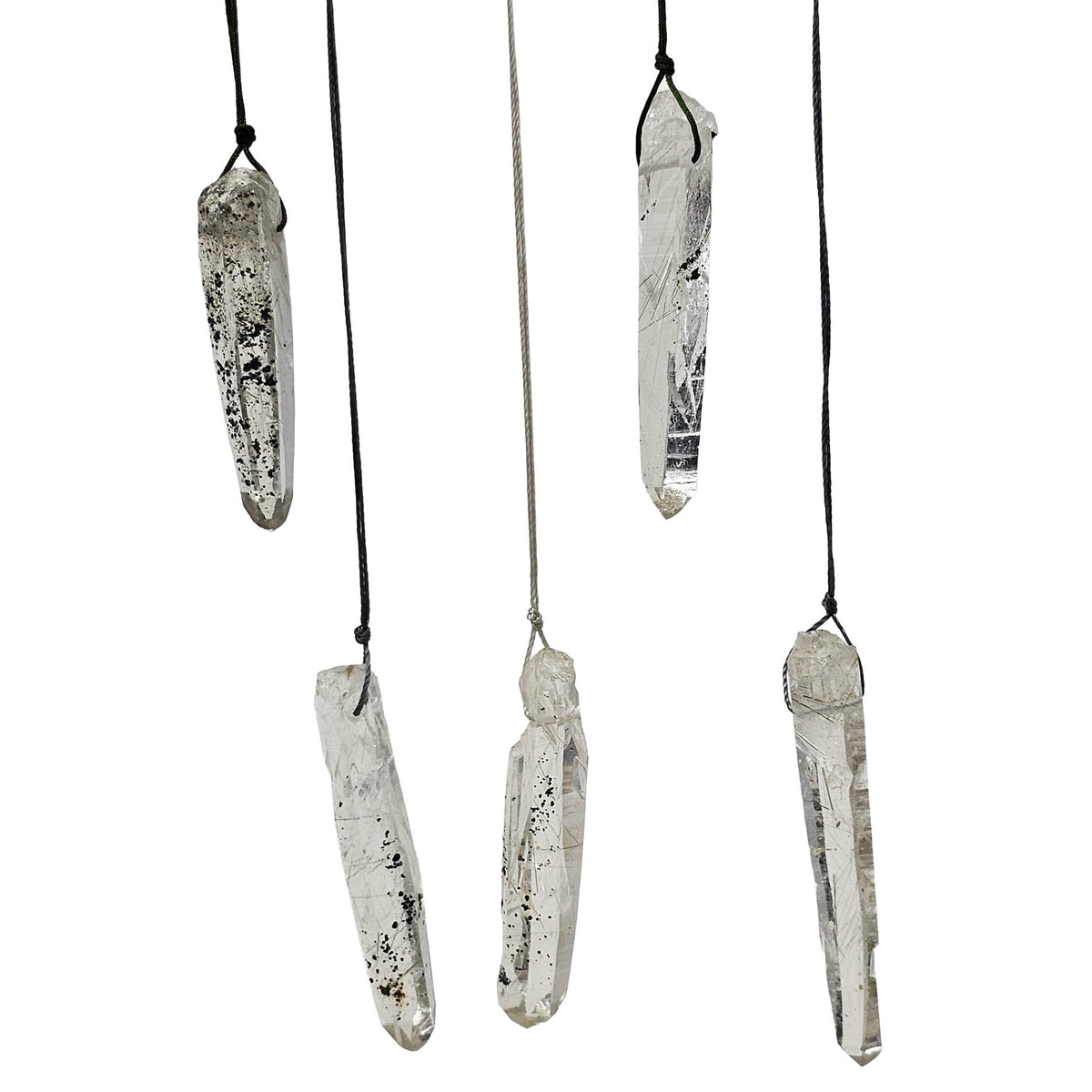 Actinolite quartz drilled pendant, BC: four pendants hanging