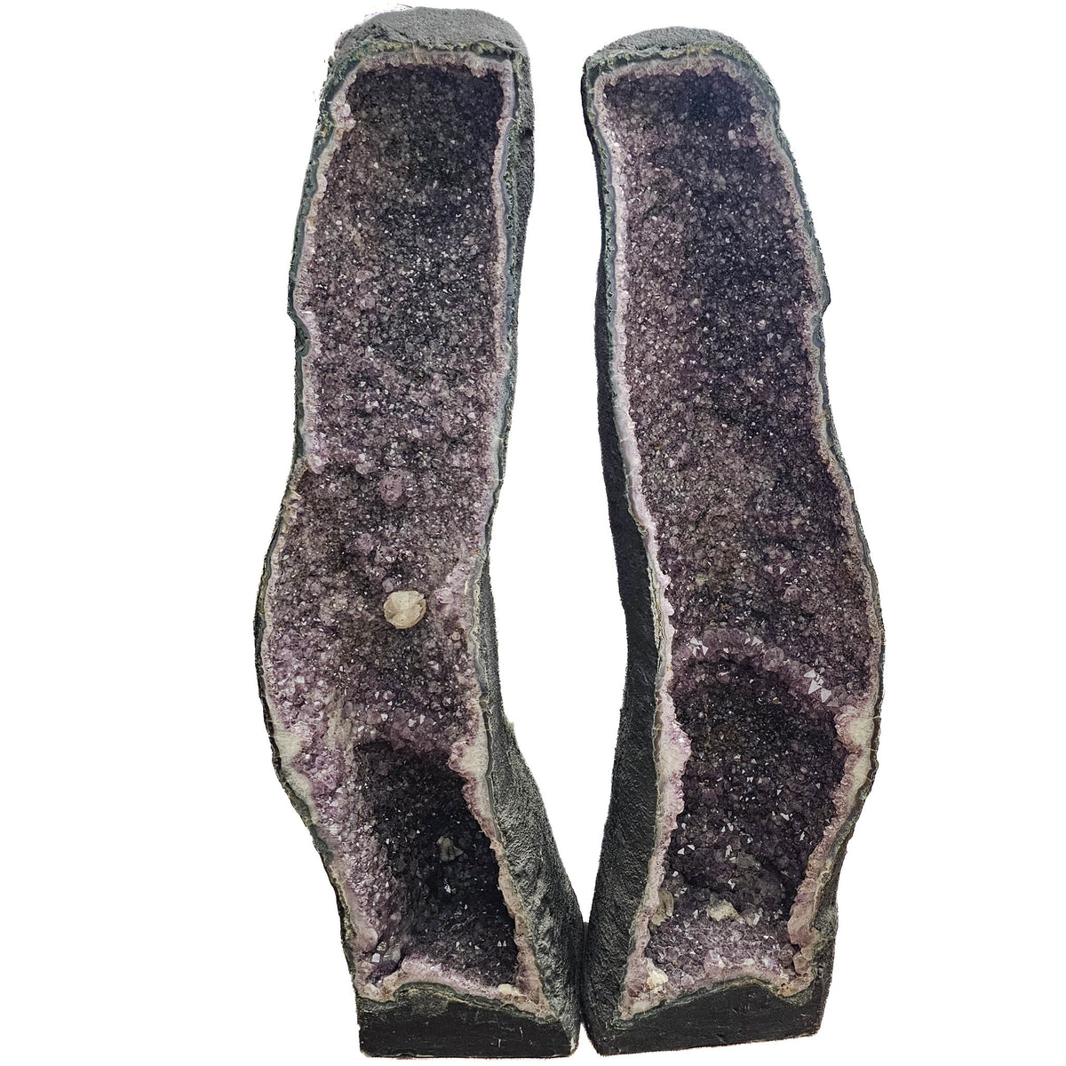 Amethyst cathedral geode pair statement specimen, a variety of quartz, from Rio Grande do Sul, Brazil.