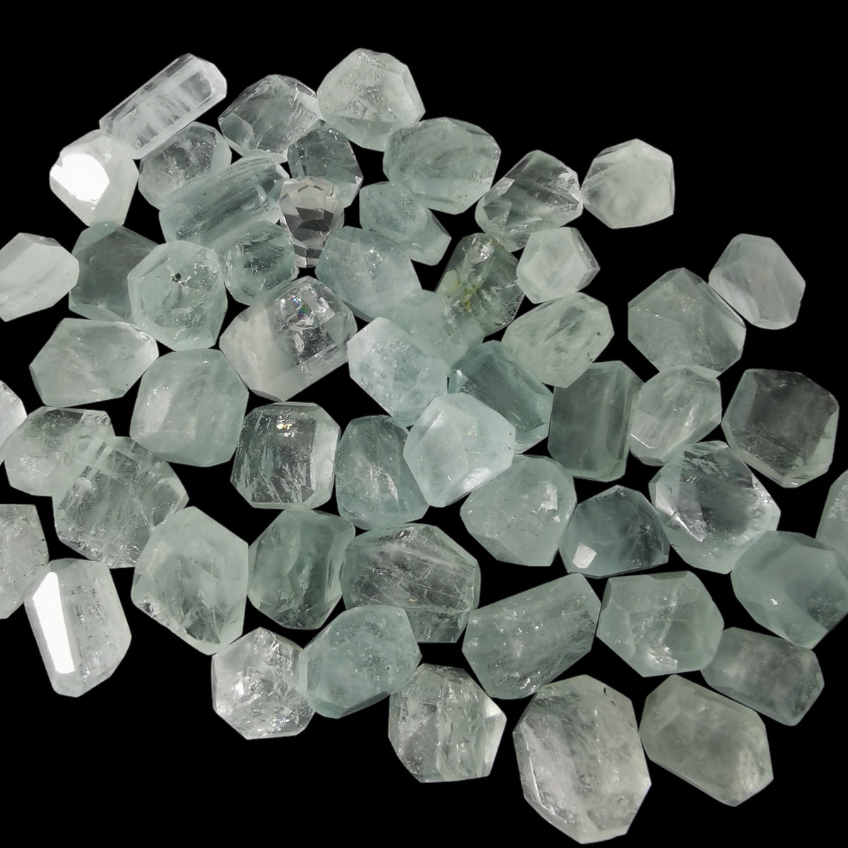 Aquamarine Freeform tumble, a variety of beryl, from Pakistan.