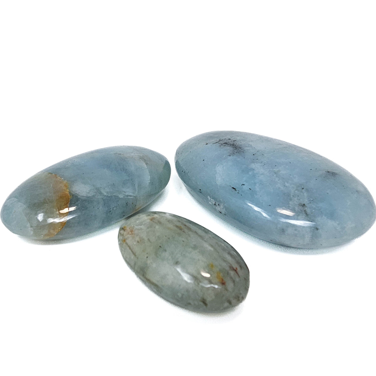 Aquamarine palm stone, a variety of beryl, from Pakistan.