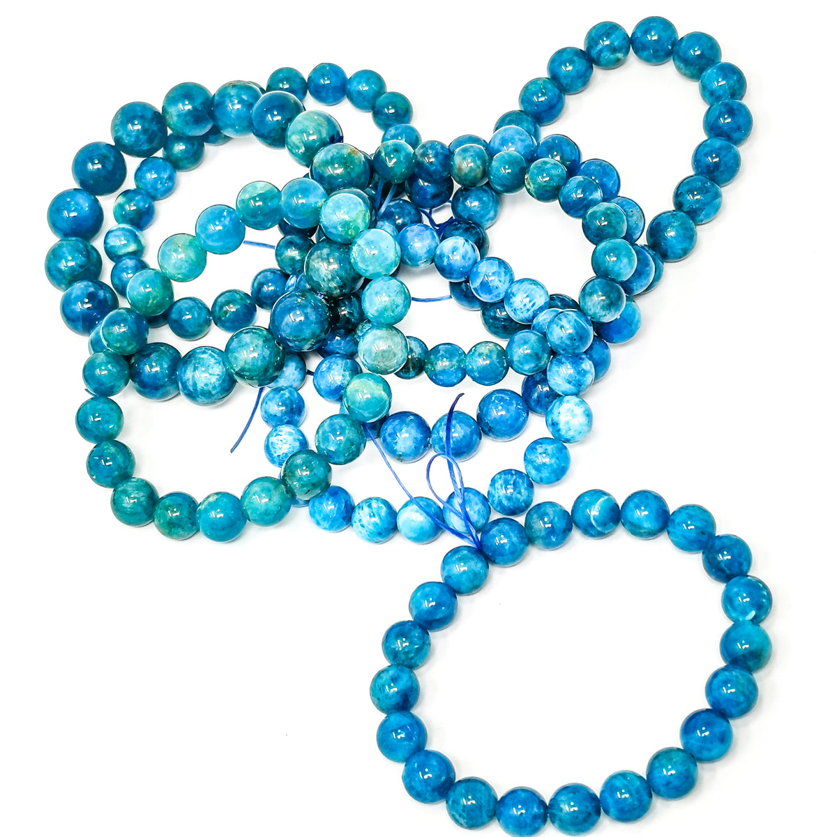 Blue apatite round bead bracelet – strands and a bracelet