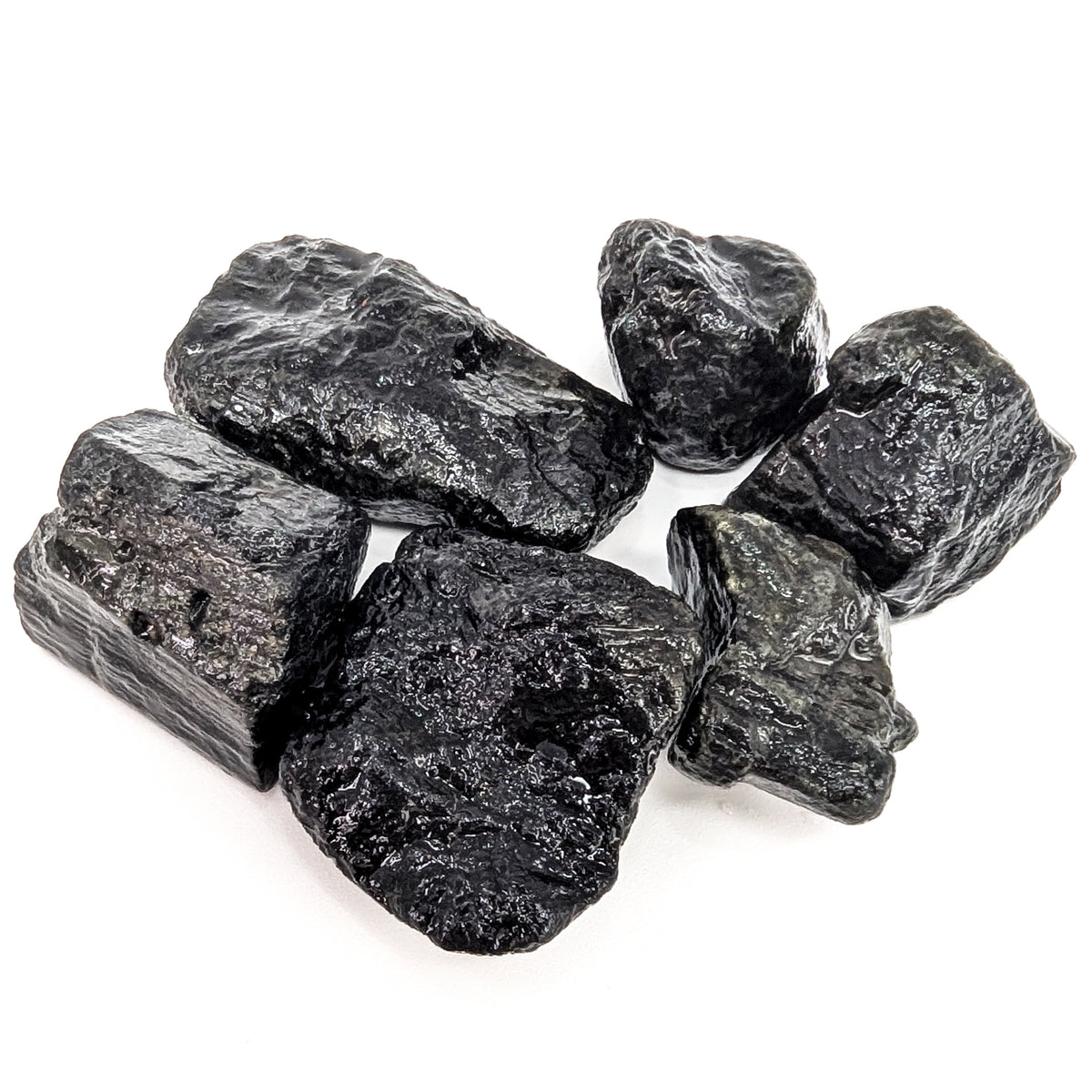 Black tourmaline (schorl) rough from Madagascar, opaque striated columnar crystal material
