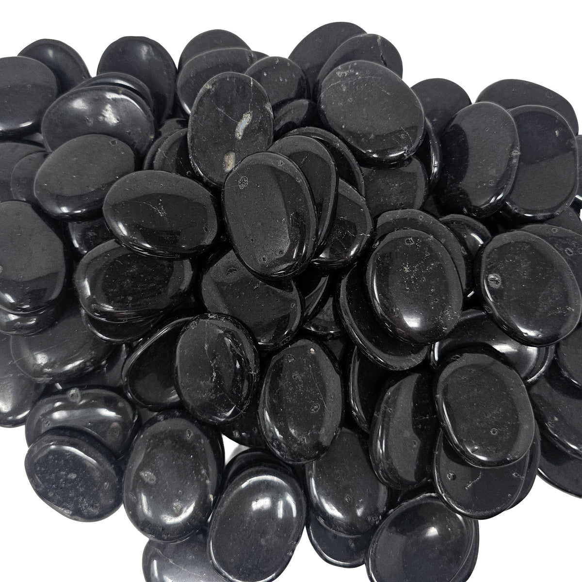 Black Tourmaline worry stone, a tourmaline group mineral, from Brazil.