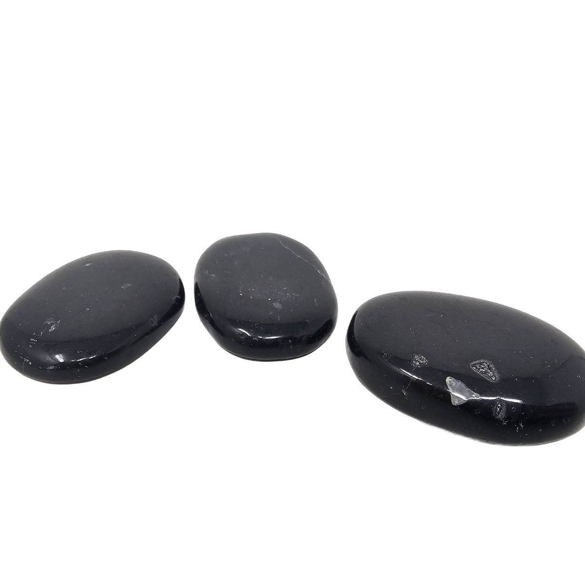 Black Tourmaline worry stone, a tourmaline group mineral, from Brazil.