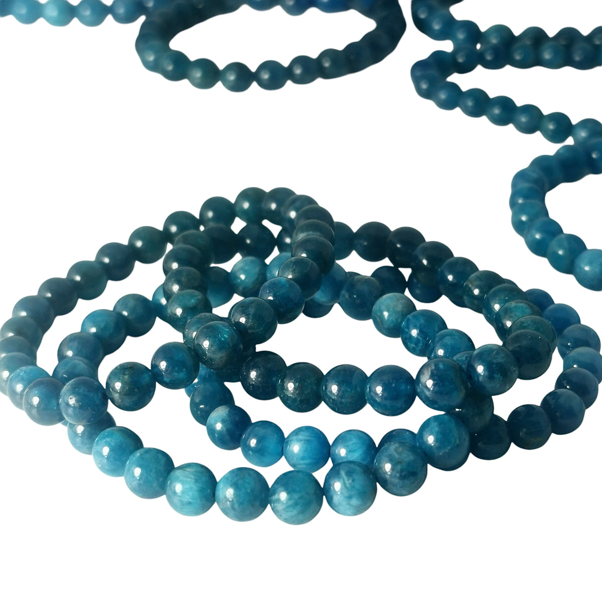 Blue apatite round bead bracelet – bracelets spread out