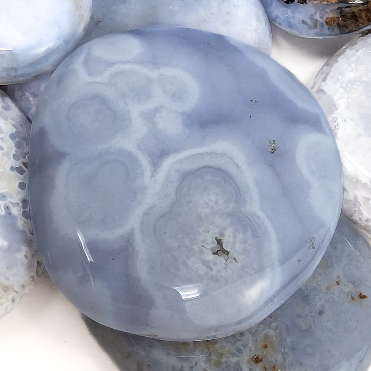 Blue Lace Agate mini freeform palm, a variety of chalcedony, from Namibia.