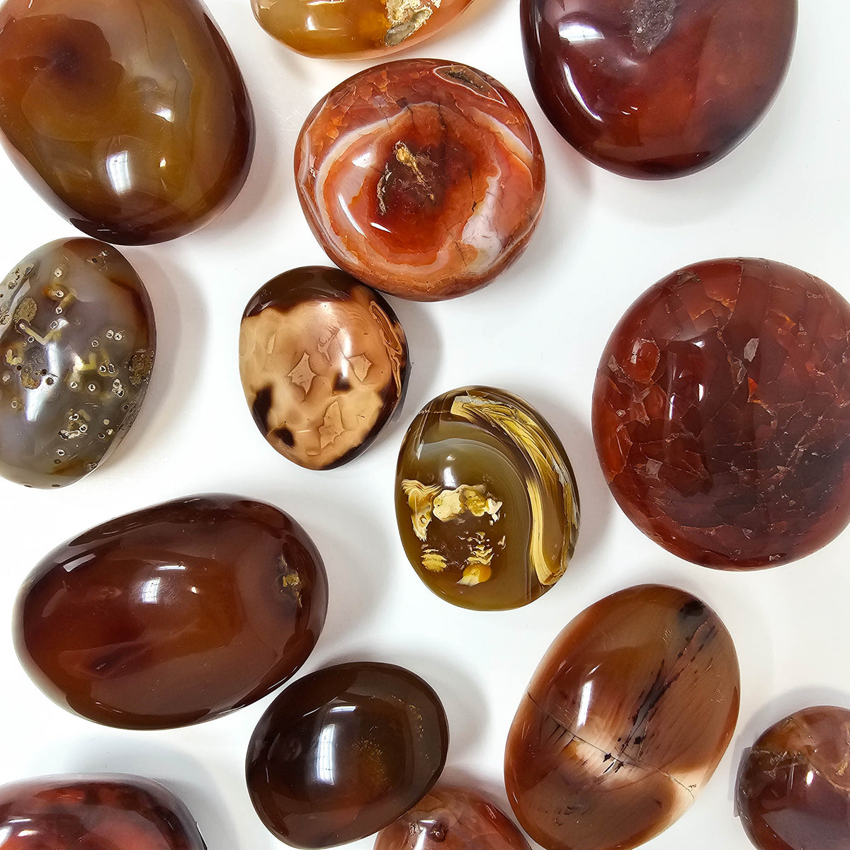 Carnelian palmstone, a variety of chalcedony, from Madagascar.
