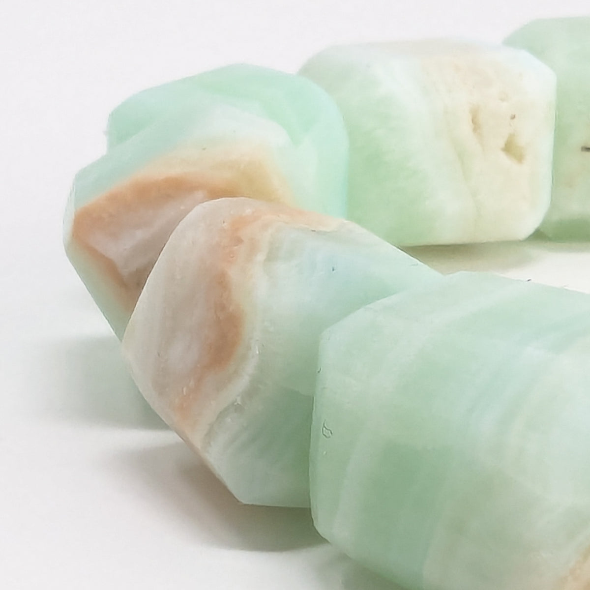 Caribbean calcite bead bracelet – banded beads, close up