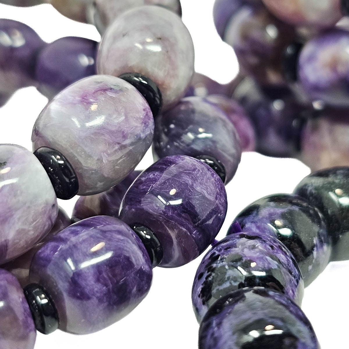 Charoite barrel bead bracelet.
