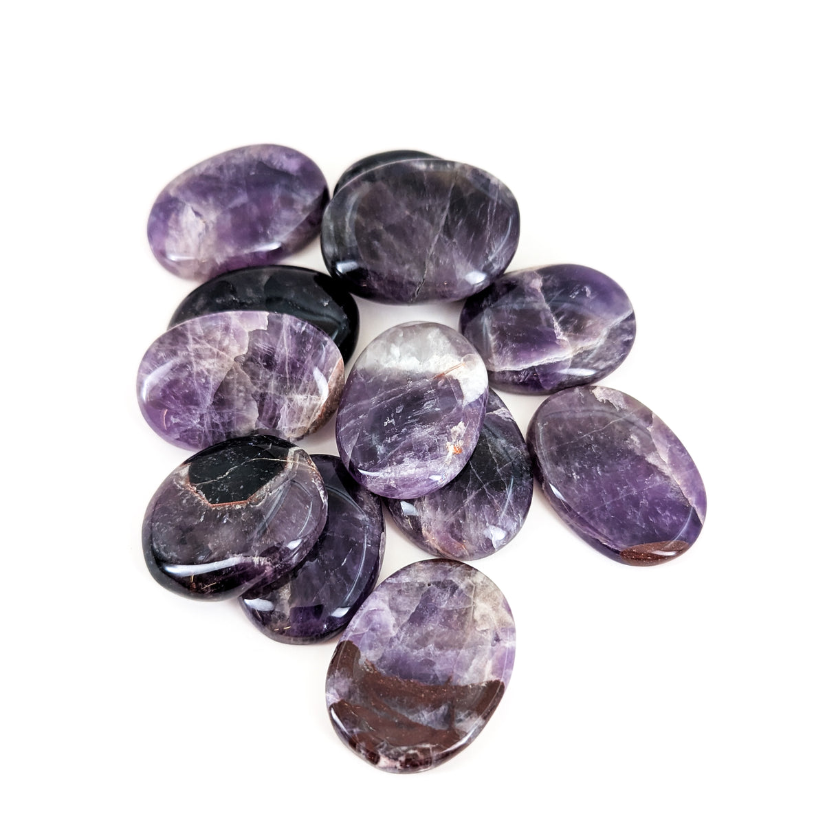 Chevron Amethyst worry stone, a variety of quartz, from Madagascar.