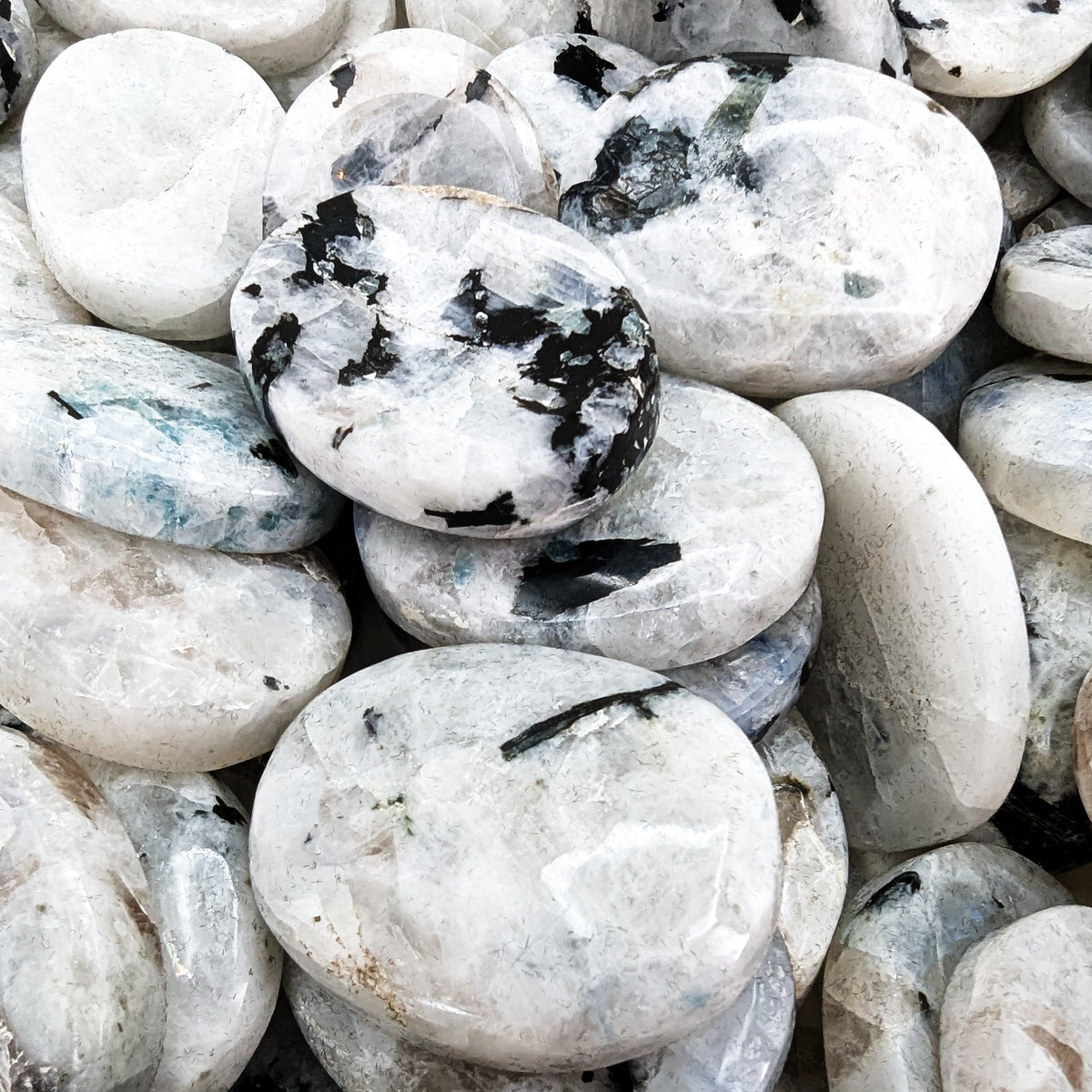 Rainbow Moonstone worry stone, a feldspar, from India.