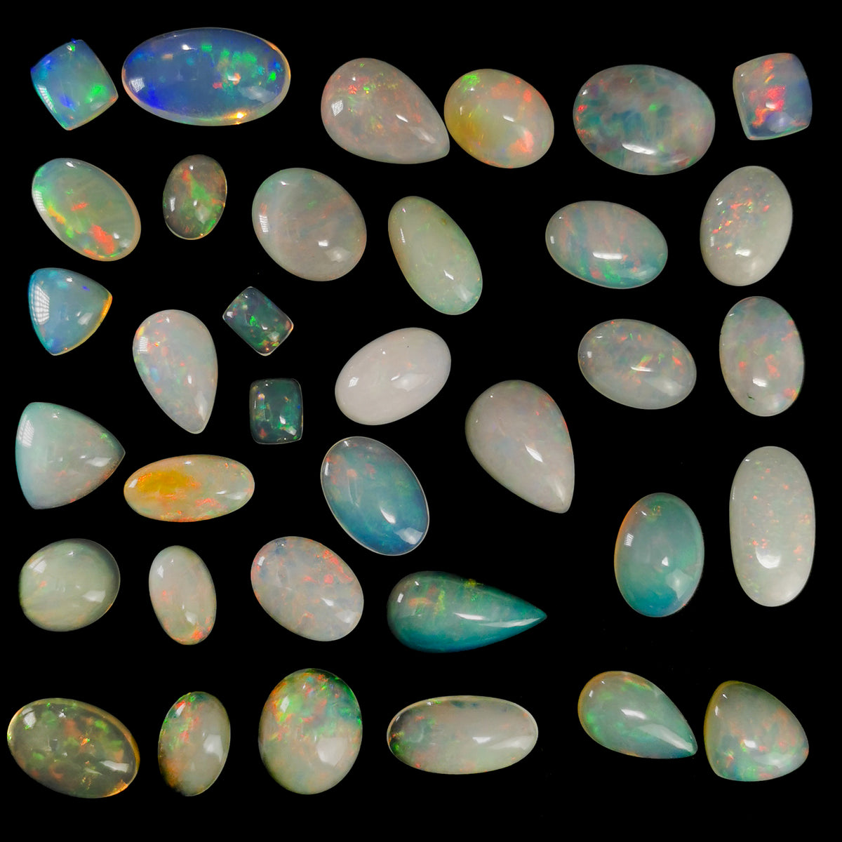 Ethiopian Opal cabochon, hydrated silica, from Tsehay Mewcha, Amhara Region, Ethiopia.