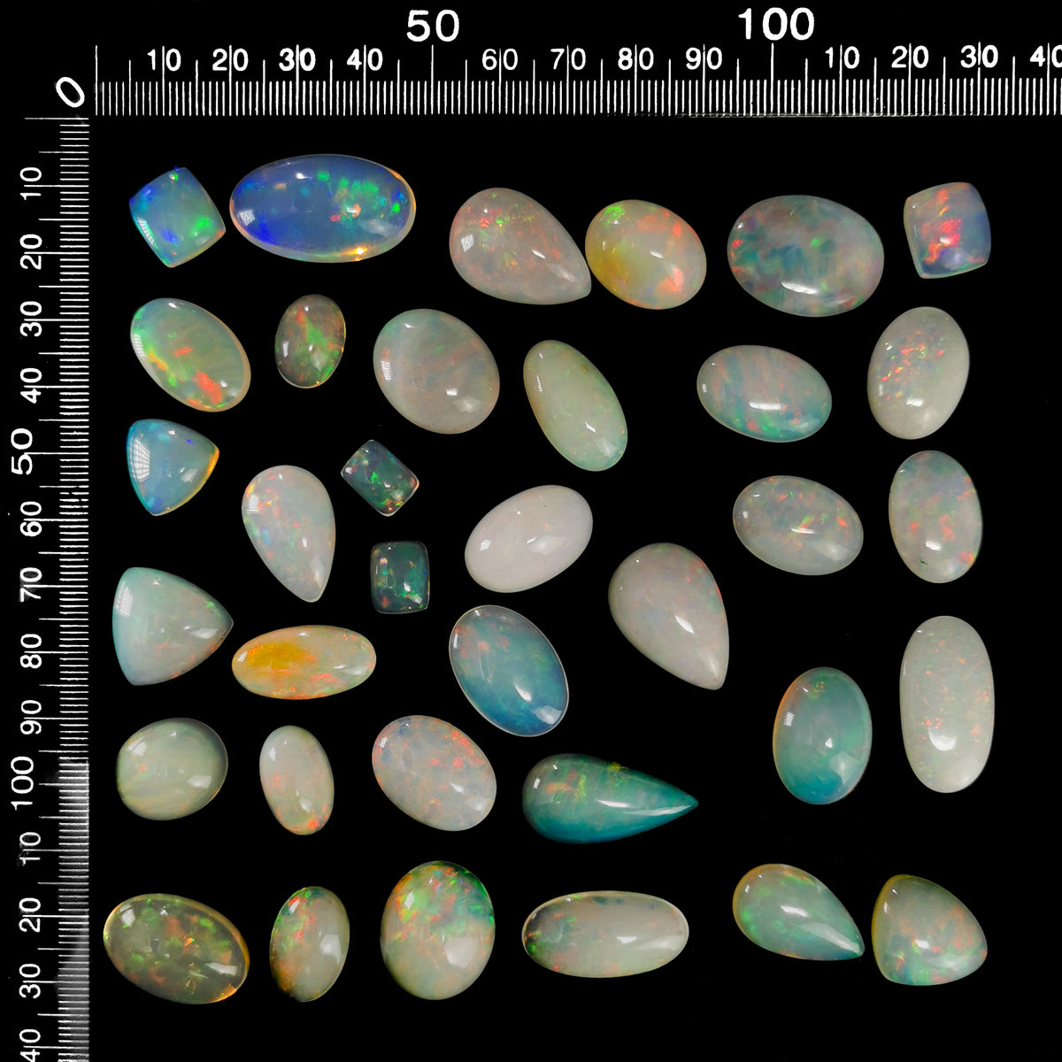Ethiopian Opal cabochon, hydrated silica, from Tsehay Mewcha, Amhara Region, Ethiopia.