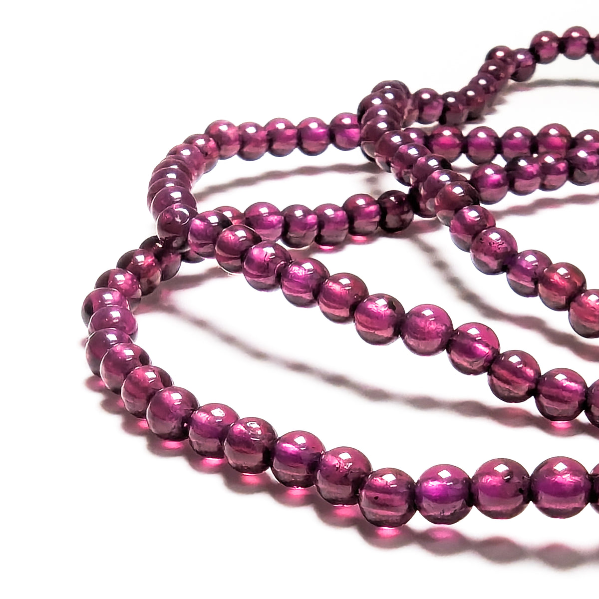 Rhodolite Garnet round bead bracelet.