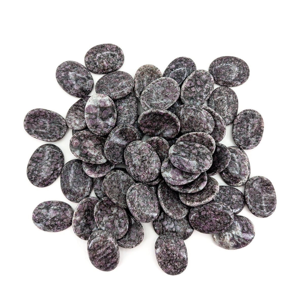 Garnet in Schist worry stone from India.