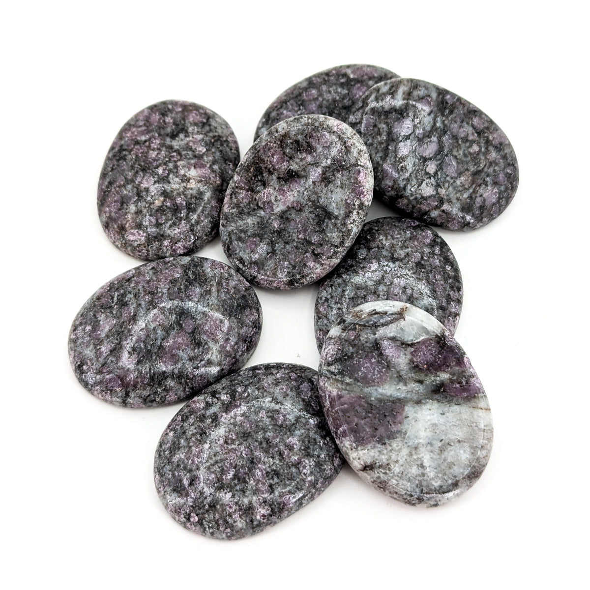 Garnet in Schist worry stone from India.