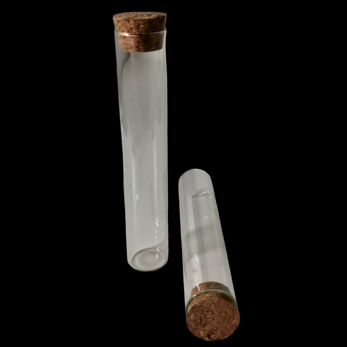 Glass Vial With Cork display, made of glass and cork.
