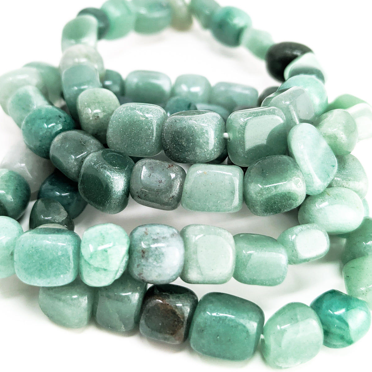Green aventurine tumbled bead bracelet – stack of bracelets, close view