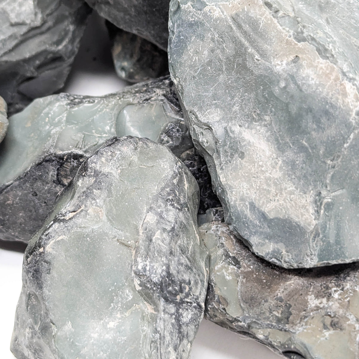 Green / Blue Obsidian rough, a volcanic glass, from Burns, Oregon, USA.