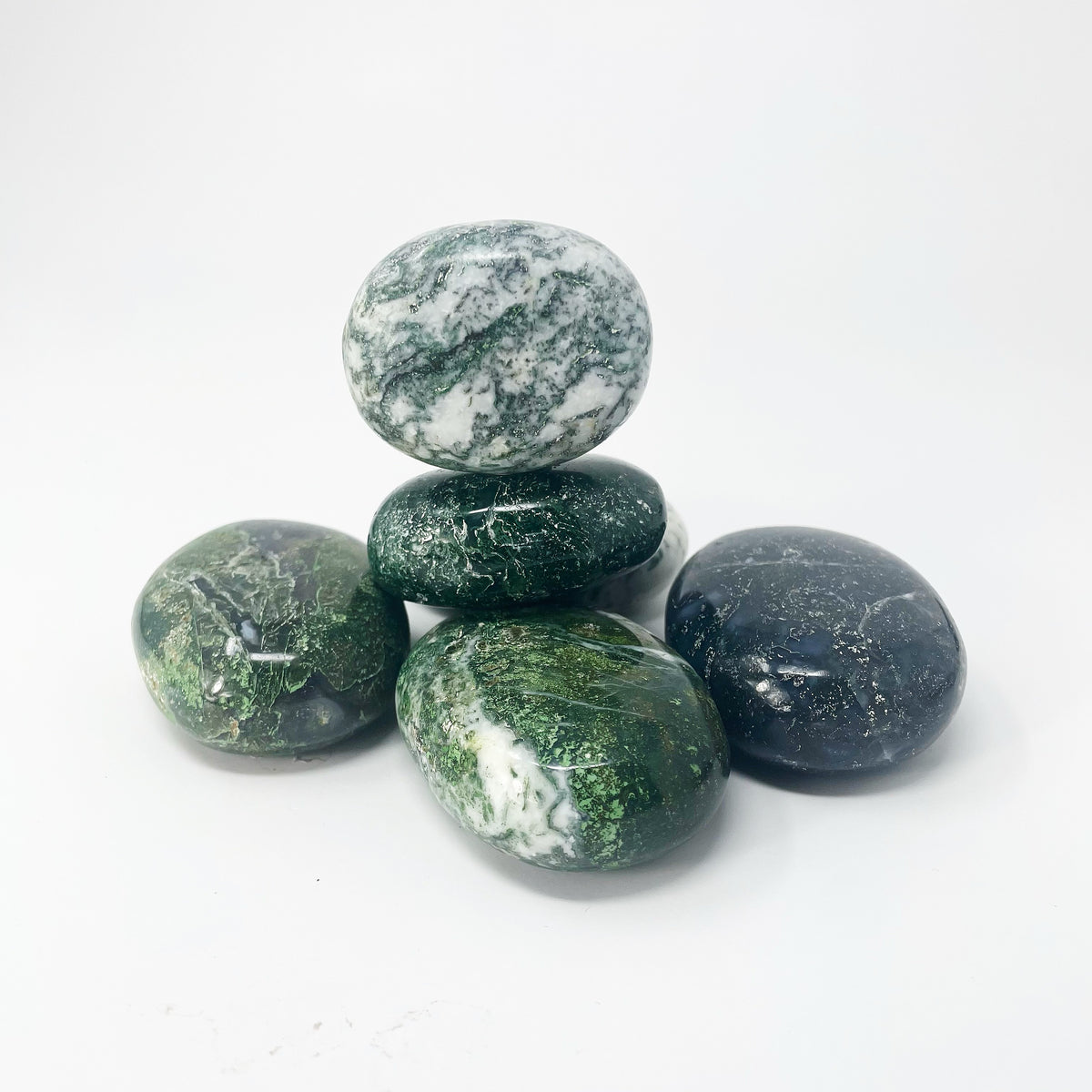 Moss Agate palm stone, a variety of chalcedony, from India.