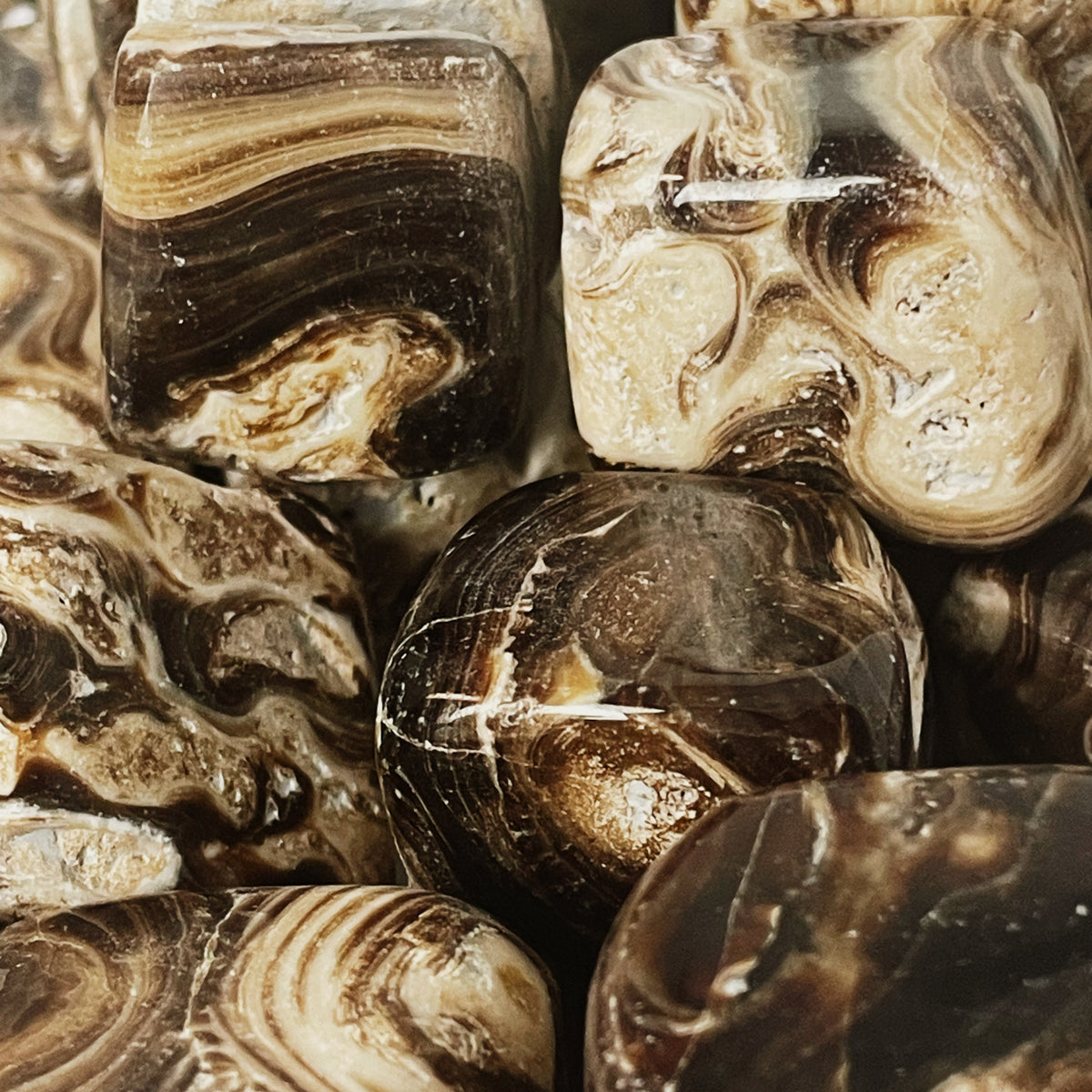 Chocolate Calcite tumble, calcium carbonate.
