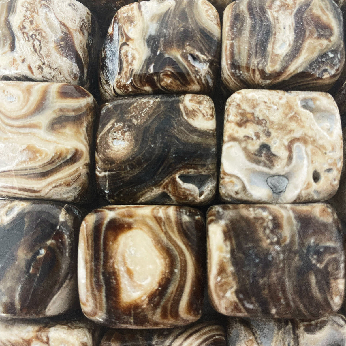 Chocolate Calcite tumble, calcium carbonate.