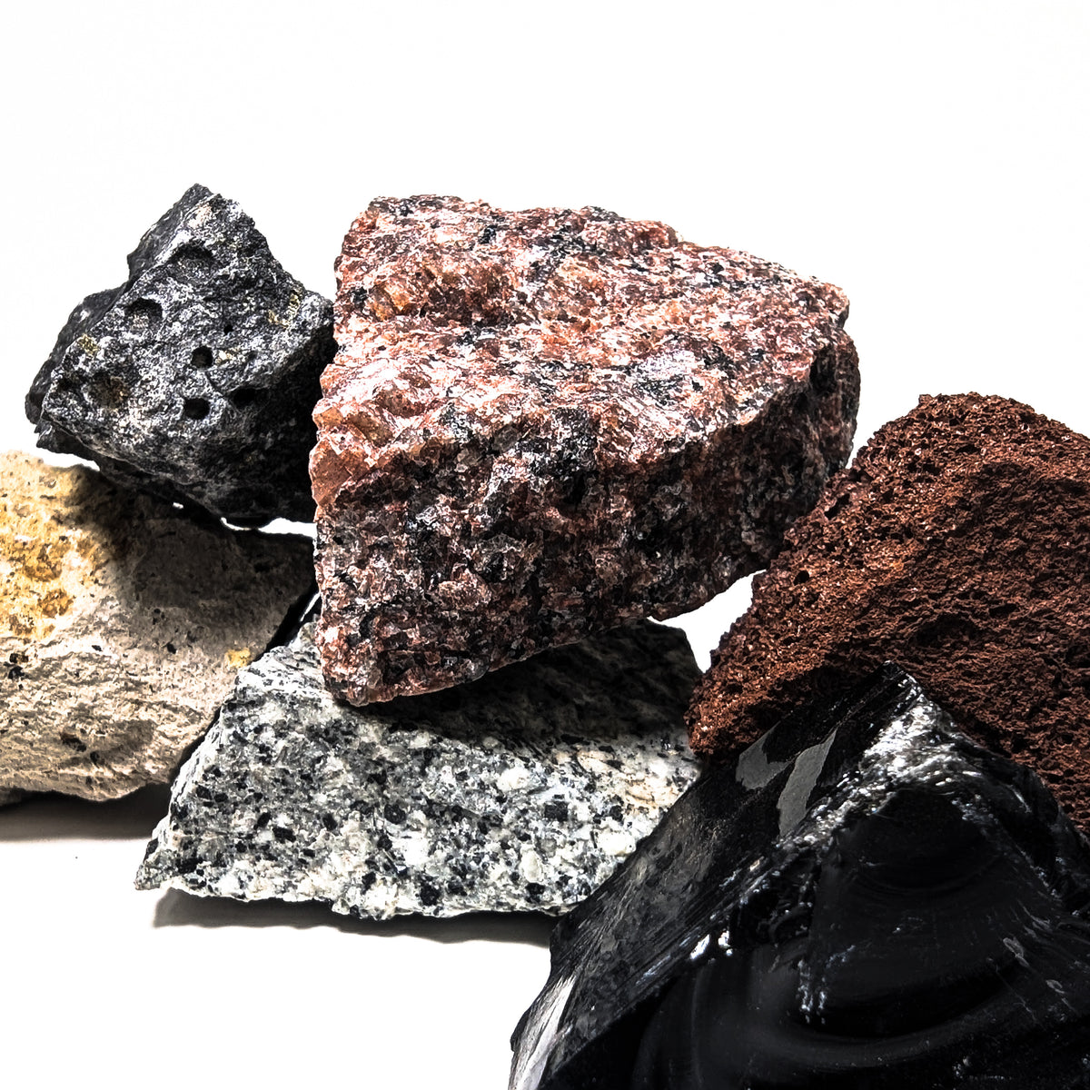 Igneous rock education set – granite and obsidian close-up