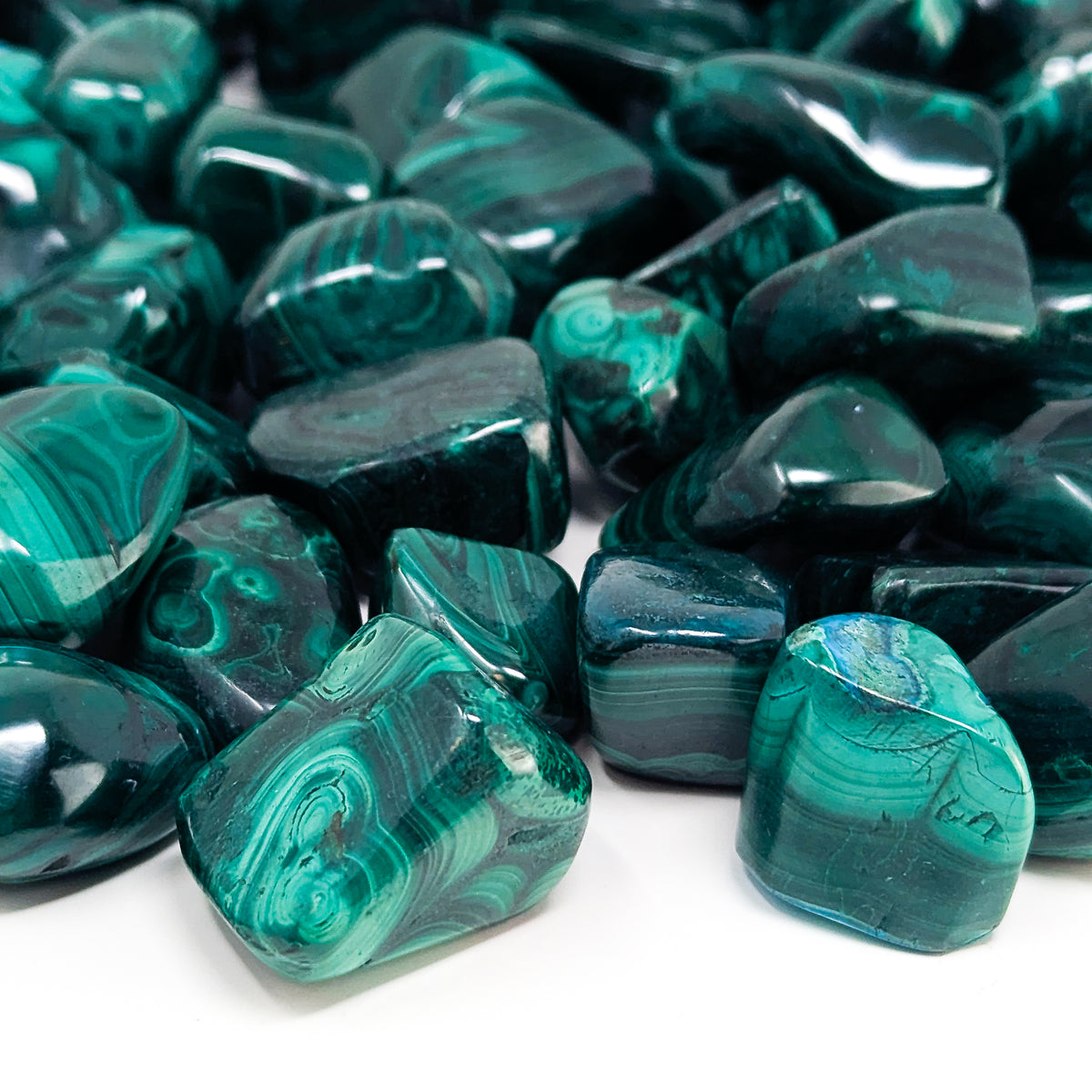 Malachite tumble, a copper carbonate.