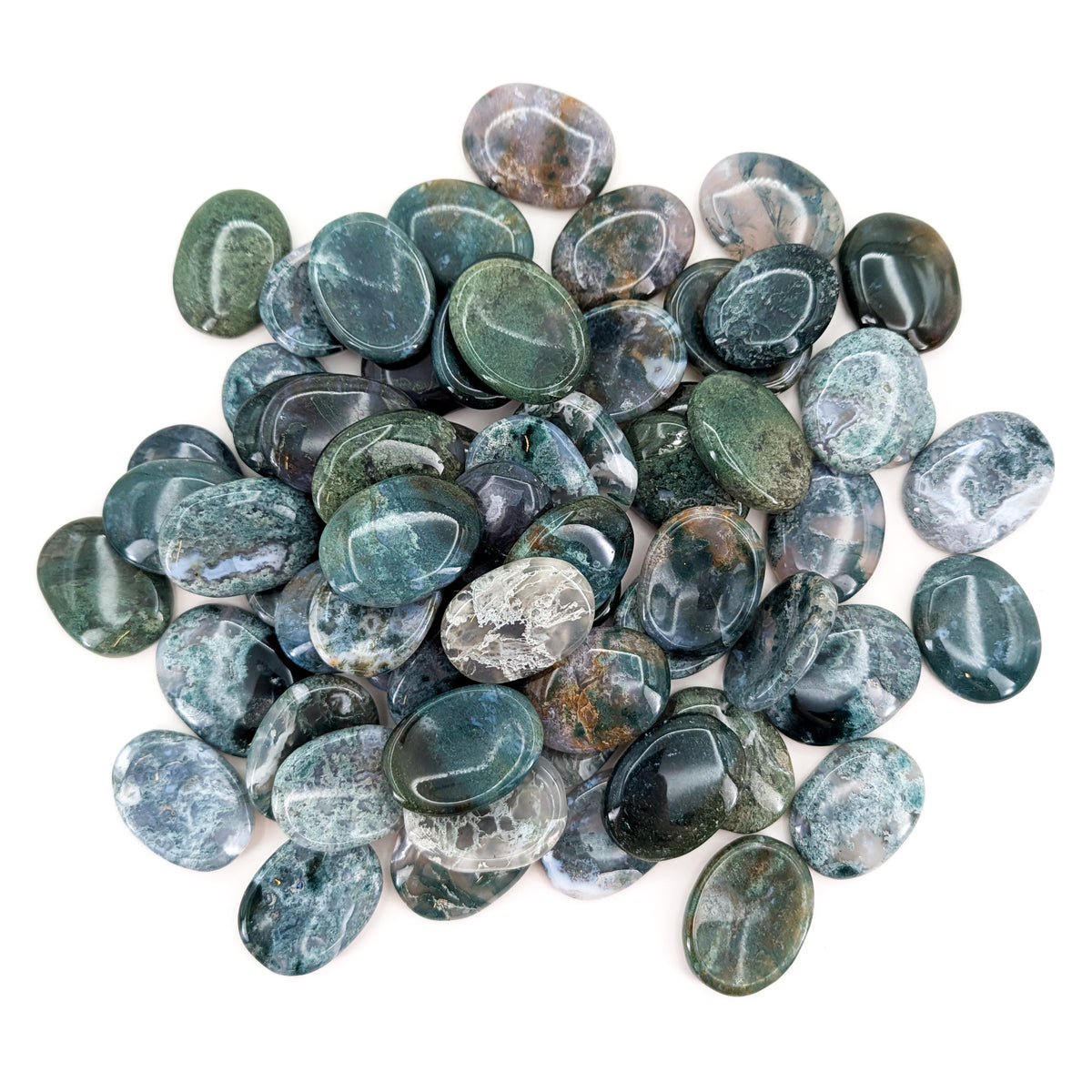 Moss Agate worry stone, a variety of chalcedony, from India.