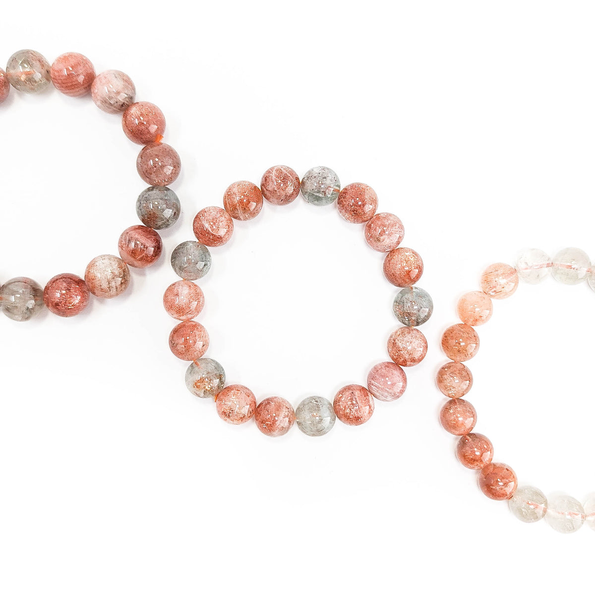 Multicoloured Specular Sunstone round bead bracelet.