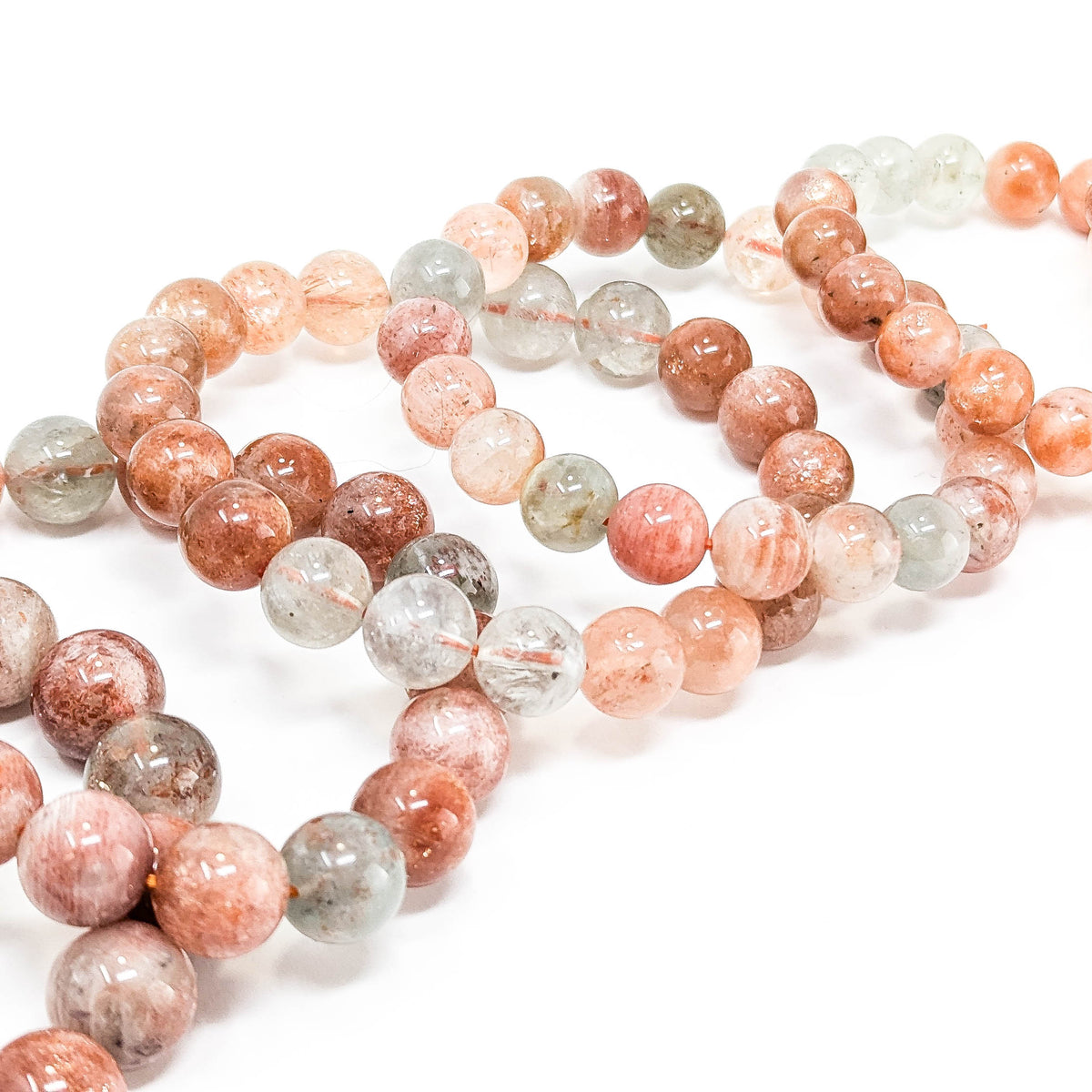 Multicoloured Specular Sunstone round bead bracelet.