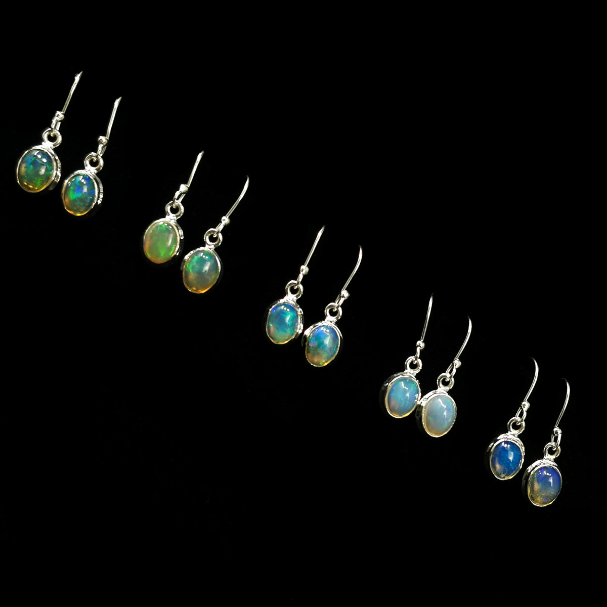 Opal Dished earing (oval) in sterling silver.