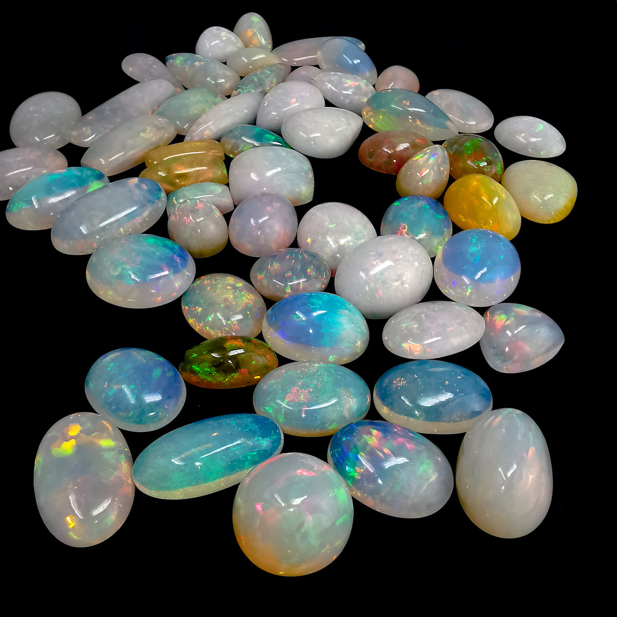 Ethiopian Opal cabochon, hydrated silica, from Tsehay Mewcha, Amhara Region, Ethiopia.