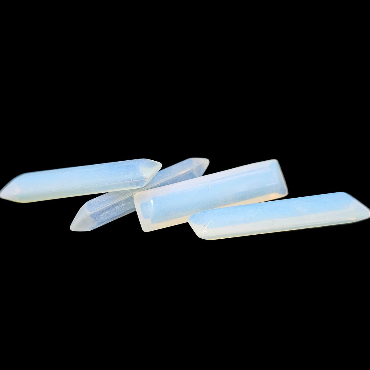 Opalite faceted rectangle tumble – four pieces