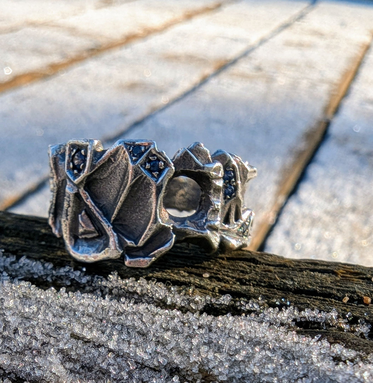 Hydrus free flow ring with Blue Sapphire.