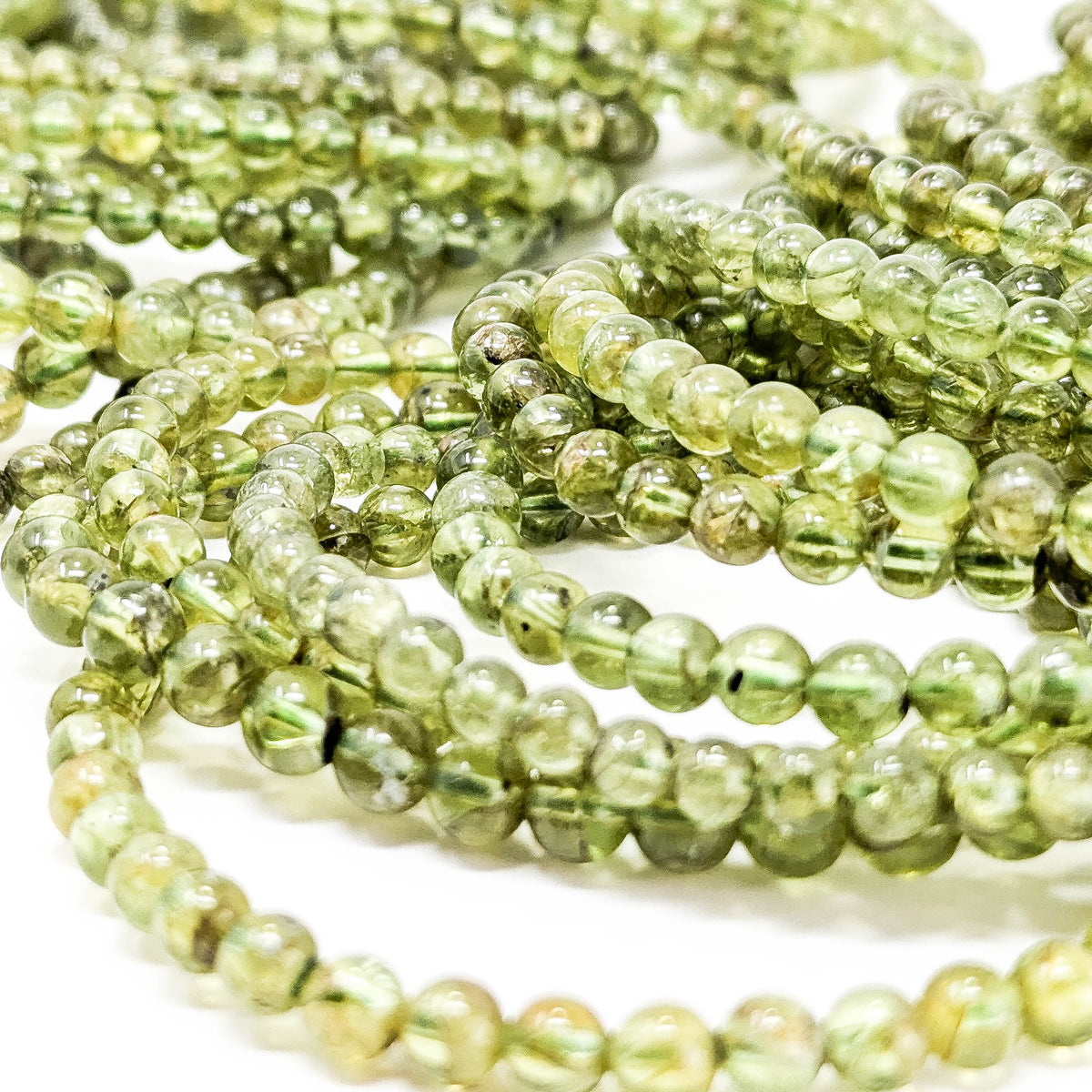 Peridot bead bracelet – close-up of bracelets
