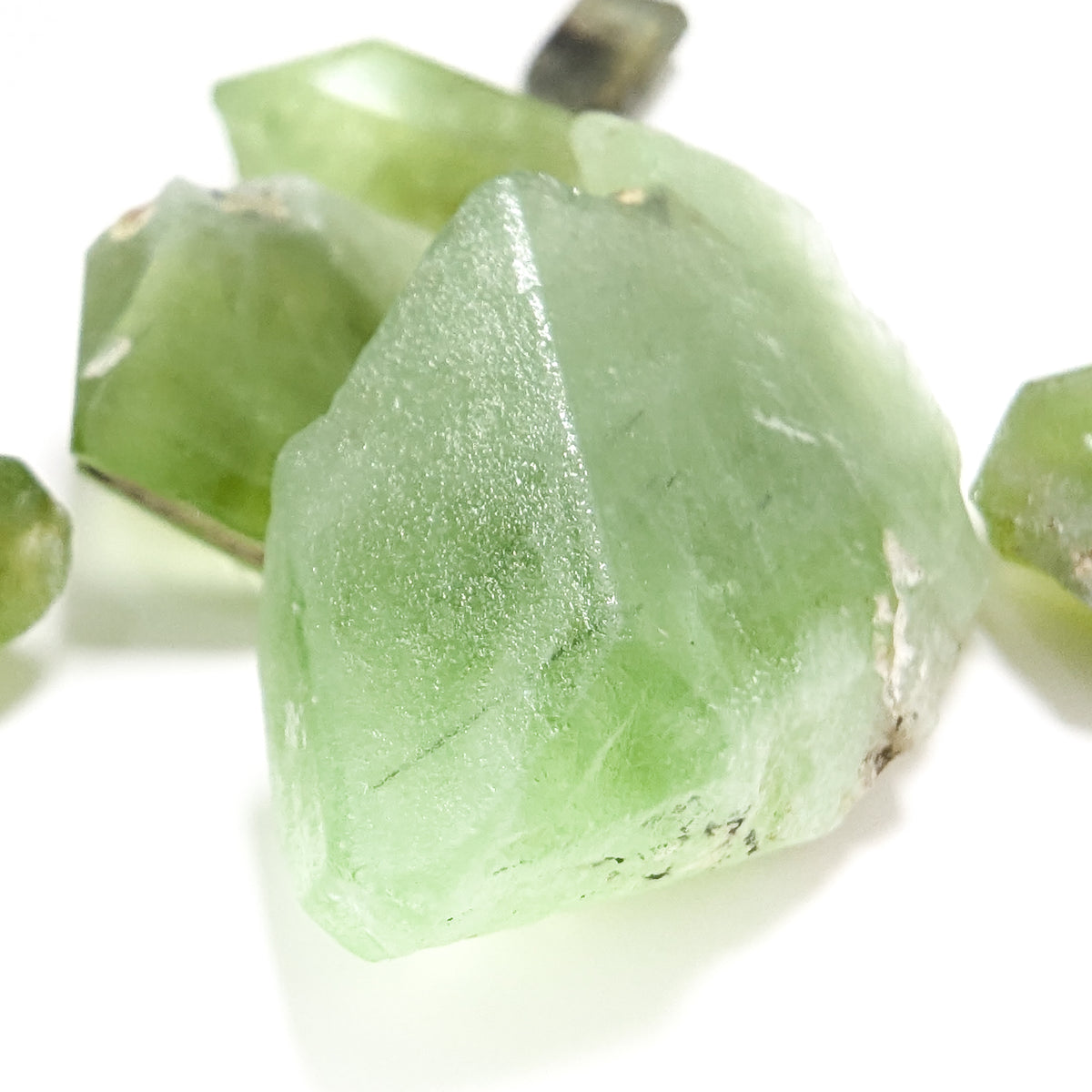 Peridot with Ludwigite specimen.